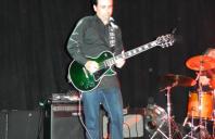 TCG’s Brian Johnson Plays Guitar, Raises Money for SF Education